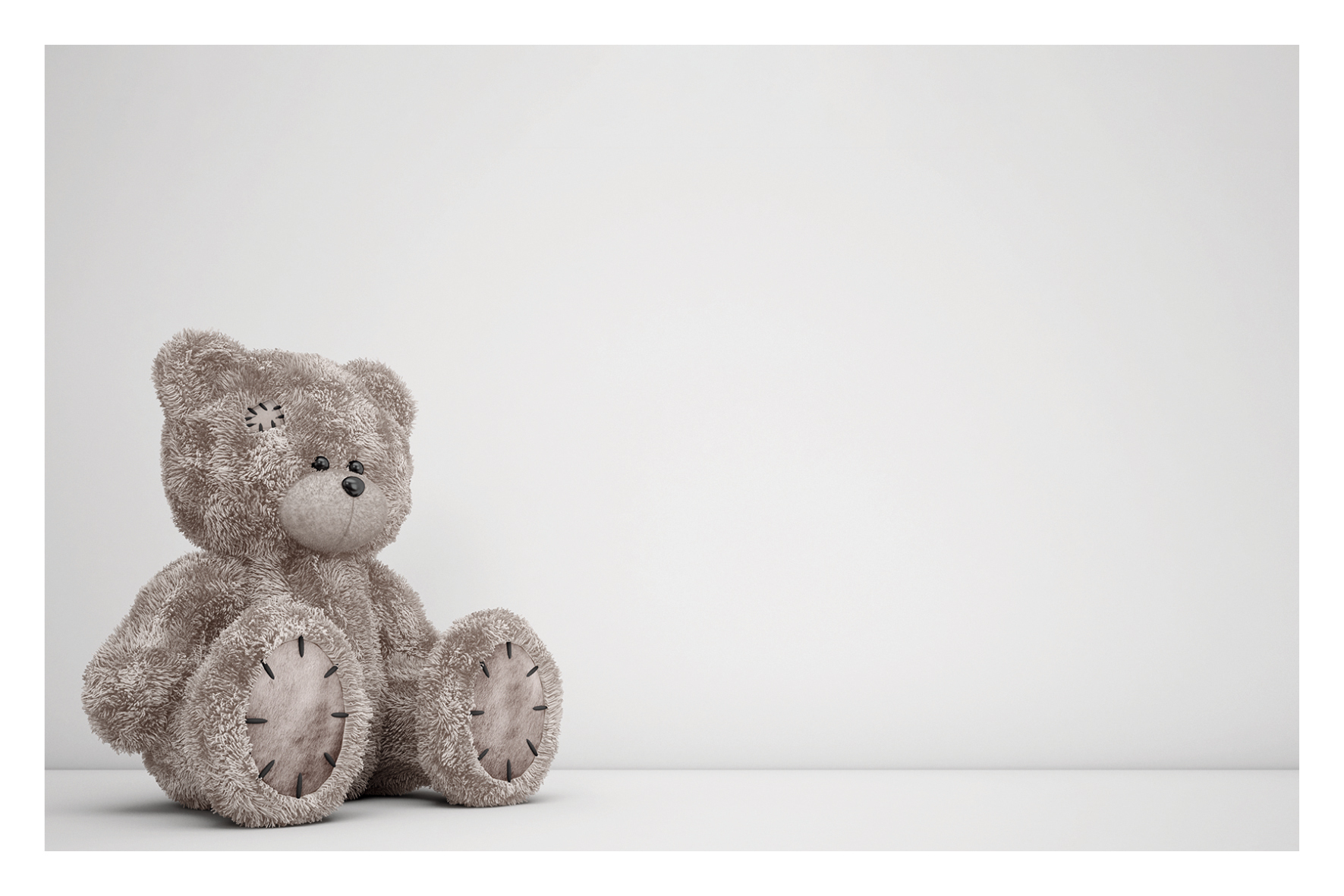Ours en peluche gris